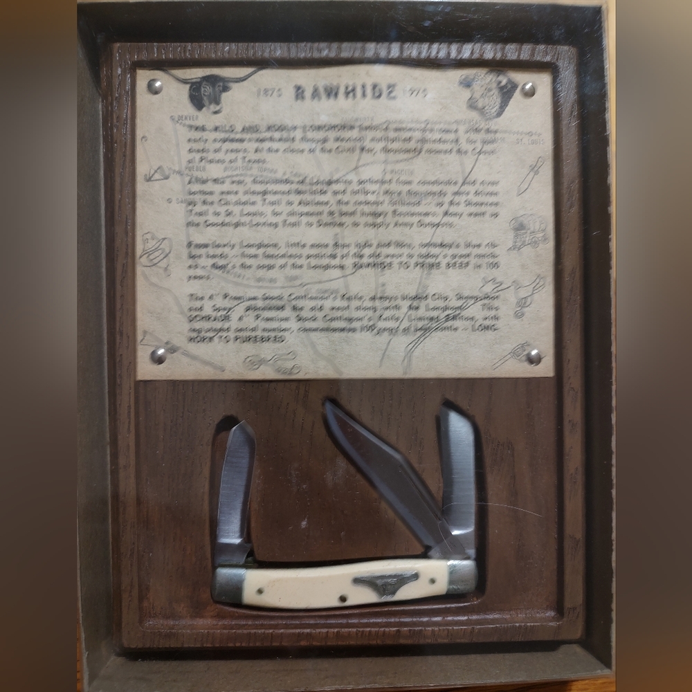 Vintage Rawhide Schrade 1975 knife in original box.Made In USA